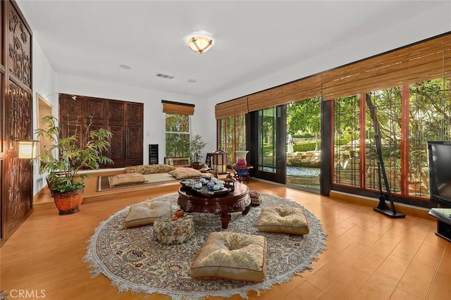 sunroom / solarium featuring plenty of natural light