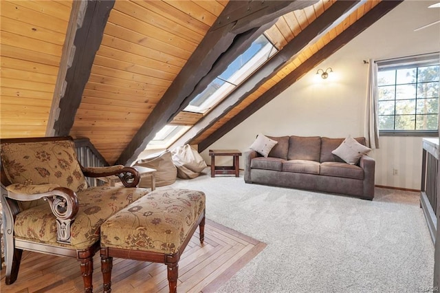 living area featuring lofted ceiling with skylight, wooden ceiling, and light wood-type flooring