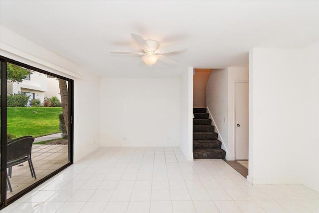 interior space featuring ceiling fan