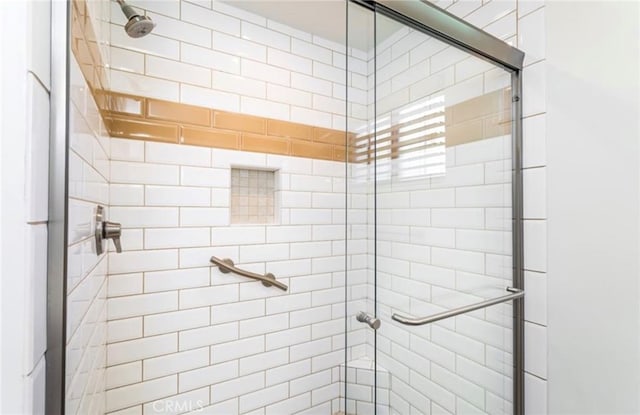 bathroom featuring walk in shower