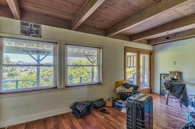 misc room with hardwood / wood-style floors, beamed ceiling, french doors, and wood ceiling