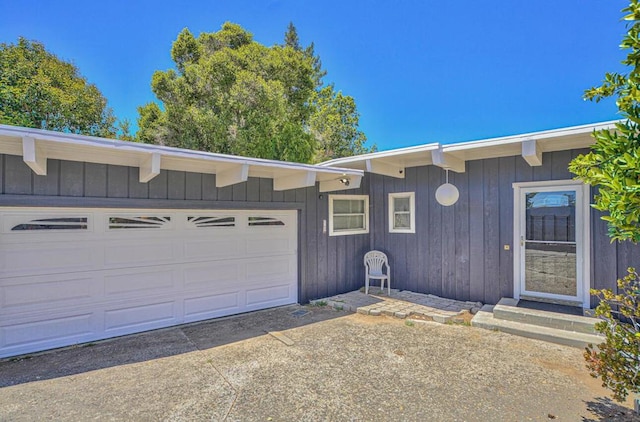 single story home with a garage