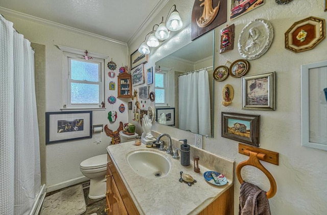 bathroom with vanity, ornamental molding, curtained shower, and toilet