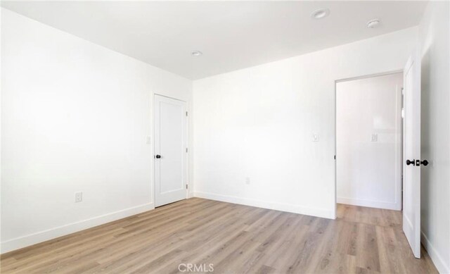 empty room featuring light hardwood / wood-style floors