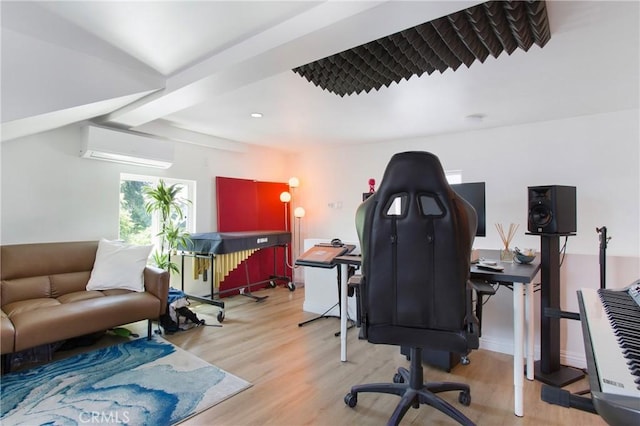 office area featuring an AC wall unit, light wood finished floors, and recessed lighting