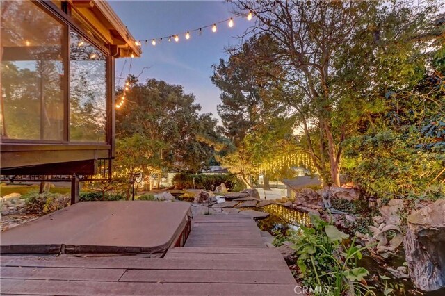 view of deck at dusk