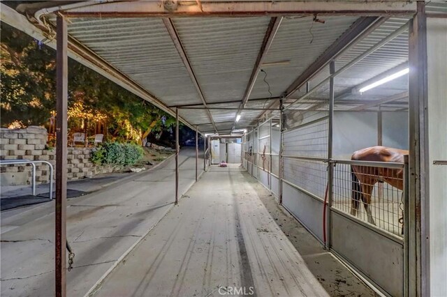 view of stable featuring water heater