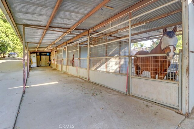 view of stable featuring water heater