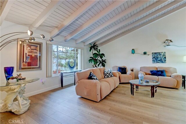 living room with vaulted ceiling with beams, light hardwood / wood-style floors, and wooden ceiling