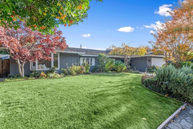 view of front of house with a front lawn