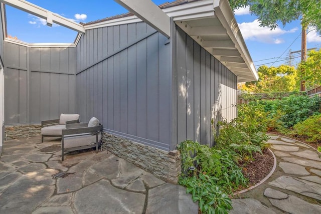 view of property exterior featuring a patio