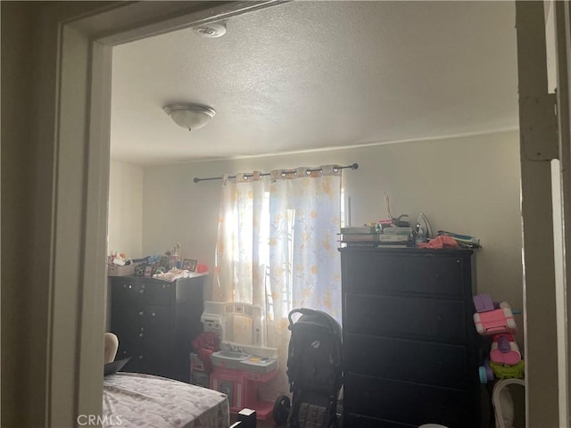 bedroom with a textured ceiling