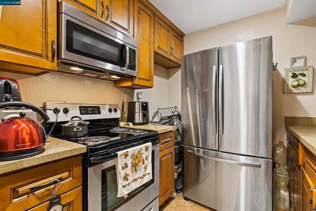 kitchen with appliances with stainless steel finishes