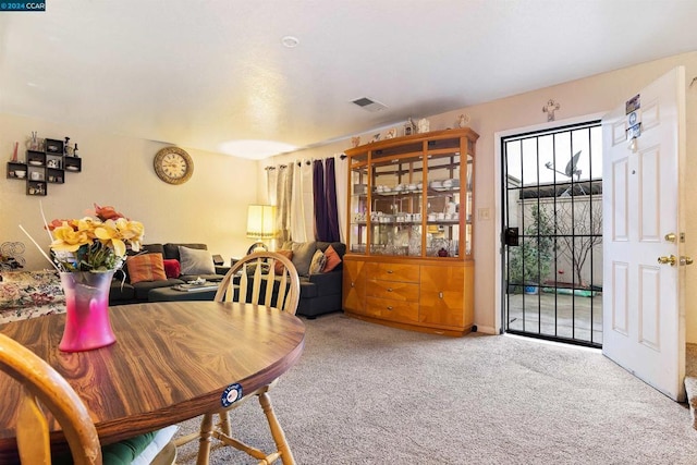 view of carpeted dining room