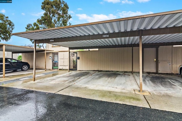 view of car parking featuring a carport