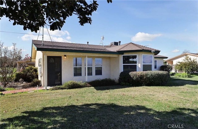 exterior space featuring a front lawn