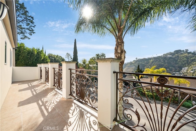 balcony featuring a mountain view