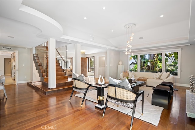 living room with a healthy amount of sunlight and wood-type flooring