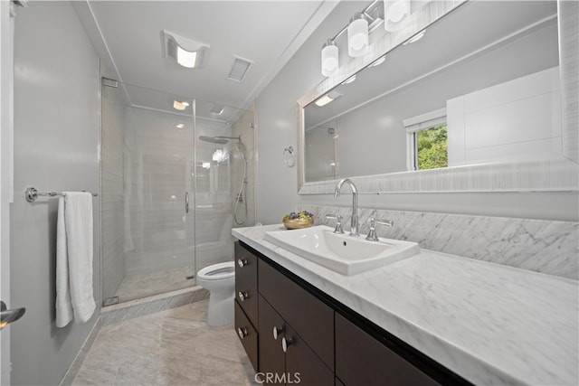 bathroom featuring walk in shower, tile patterned flooring, vanity, and toilet