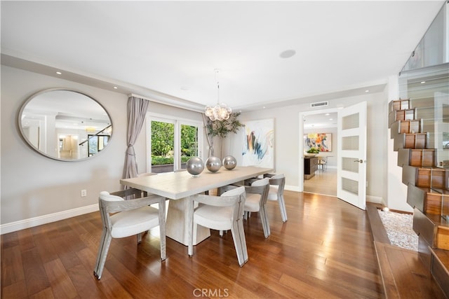 dining room with dark hardwood / wood-style floors