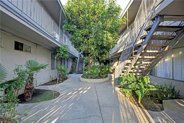 view of property's community with a patio area