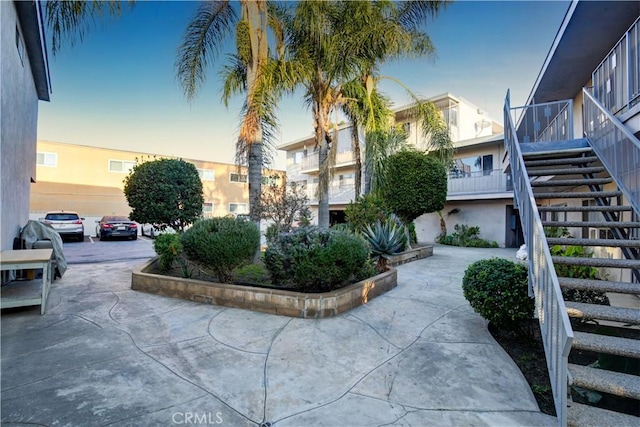 view of home's community with a patio