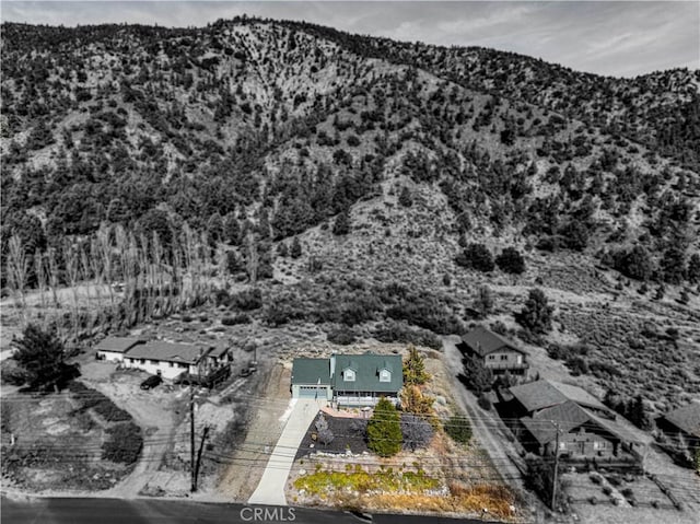 bird's eye view with a mountain view