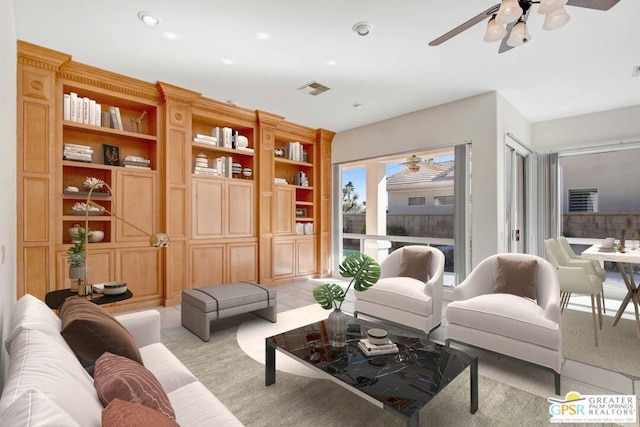 living room with ceiling fan