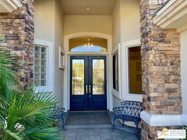 doorway to property featuring french doors