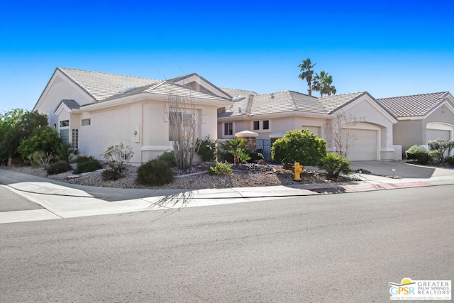 view of home's community featuring a yard and a mountain view