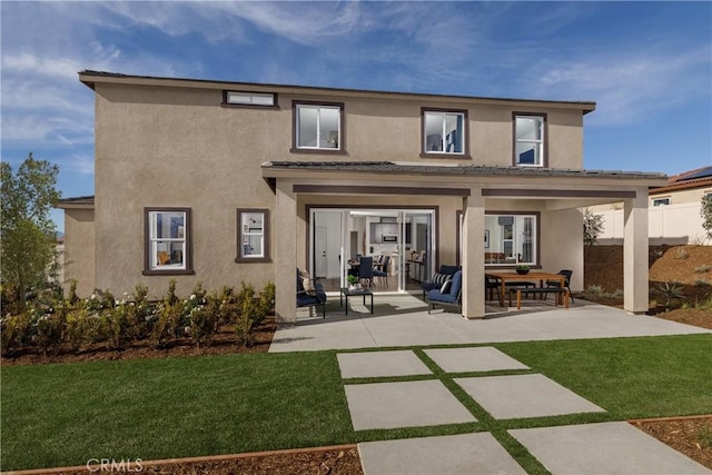 13634 Shannon St, Moreno Valley, CA 92555 - back of property featuring a yard and a patio