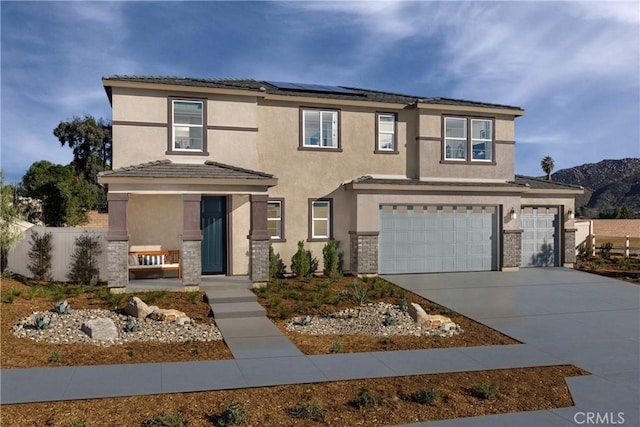 13634 Shannon St, Moreno Valley, CA 92555 - view of front property with a garage and solar panels
