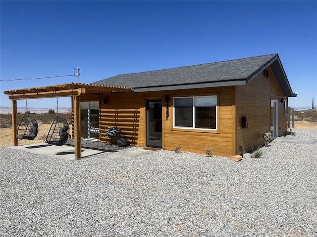 rear view of property with a patio area