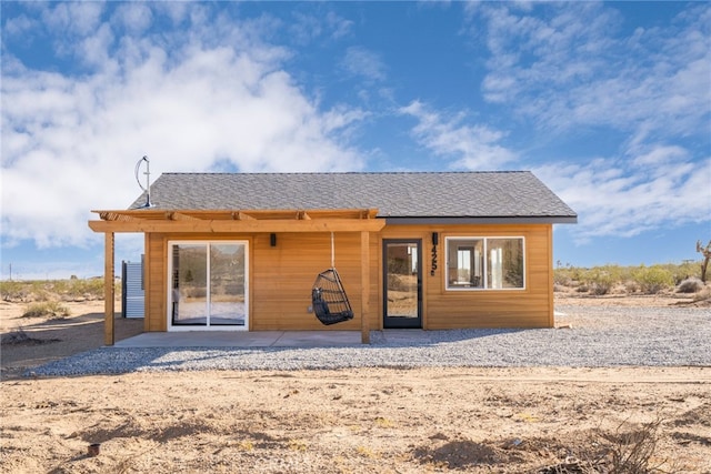 back of property featuring a patio