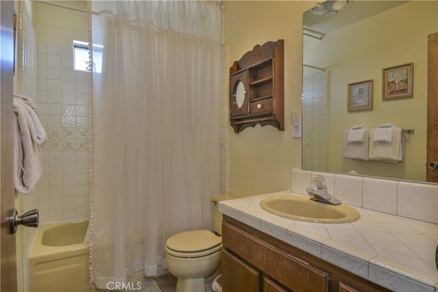 full bathroom with toilet, vanity, and shower / bathtub combination with curtain