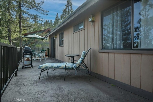 view of patio featuring a grill