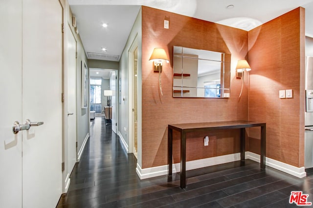 hallway featuring dark wood-type flooring