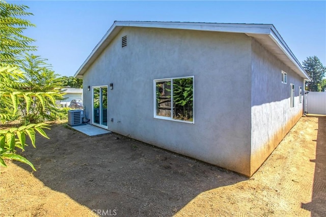 view of home's exterior featuring central air condition unit