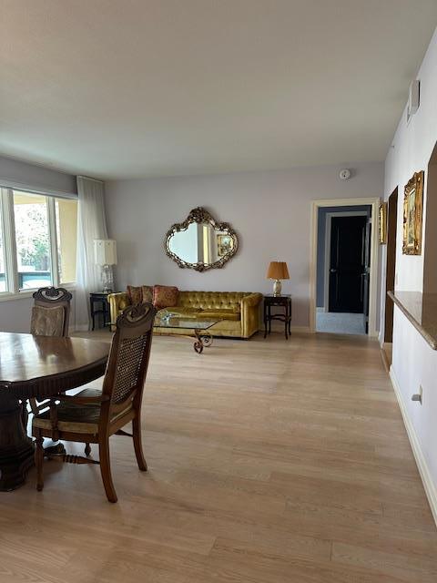 dining room with light wood-type flooring