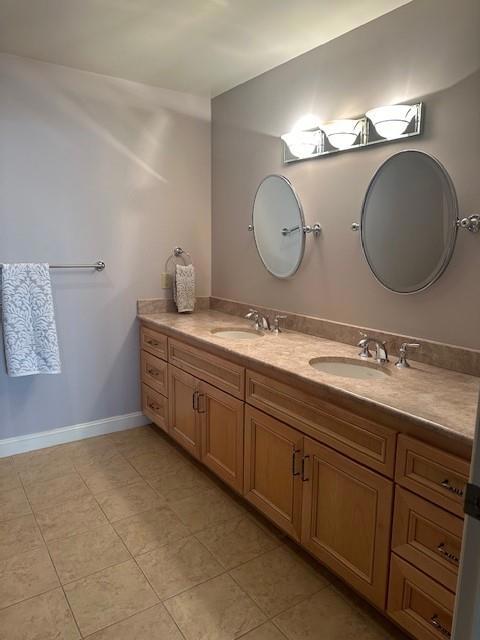 bathroom featuring vanity and tile patterned floors