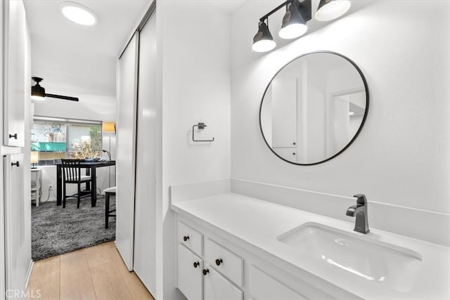 bathroom featuring vanity and hardwood / wood-style floors