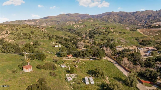 drone / aerial view featuring a mountain view