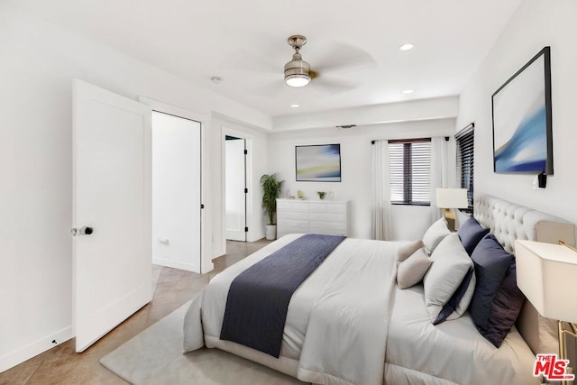 bedroom with light tile patterned floors and ceiling fan