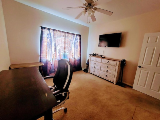 carpeted office with ceiling fan