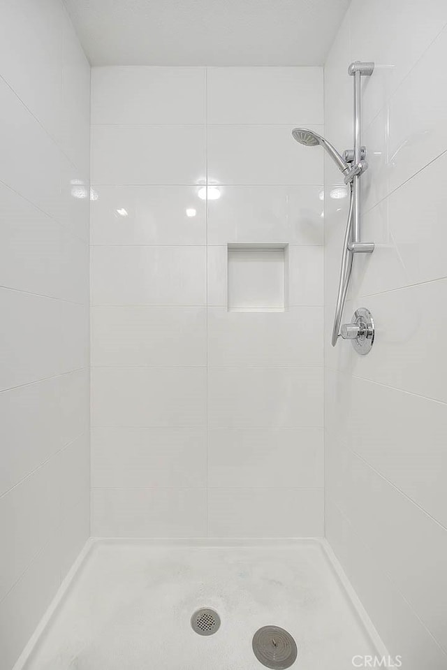 bathroom featuring a stall shower