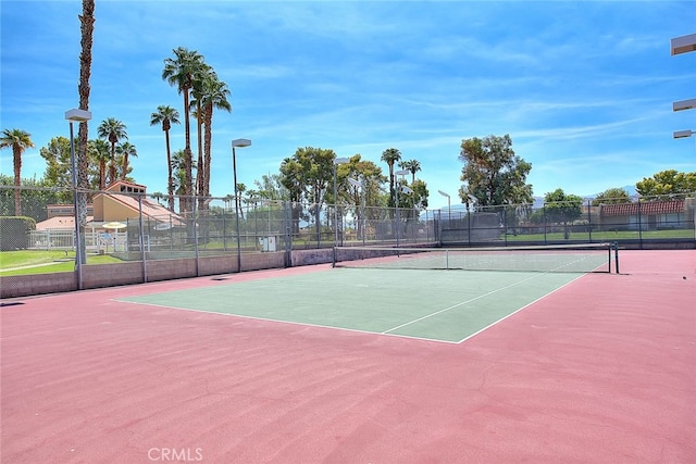 view of tennis court with basketball court