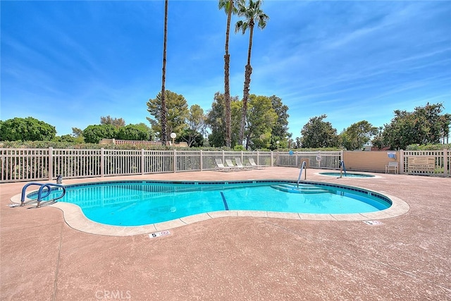 view of pool featuring a patio area