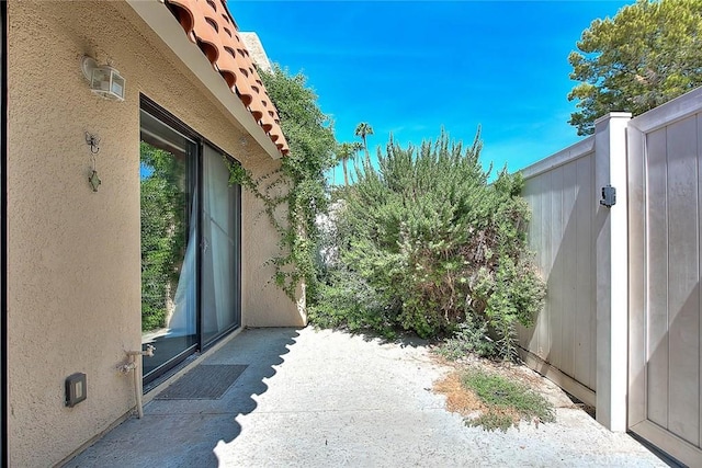view of patio / terrace with a gate