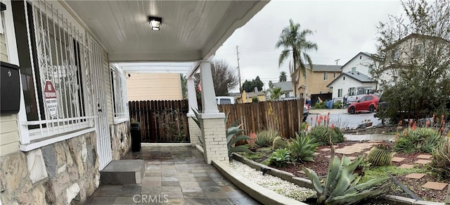 exterior space featuring covered porch