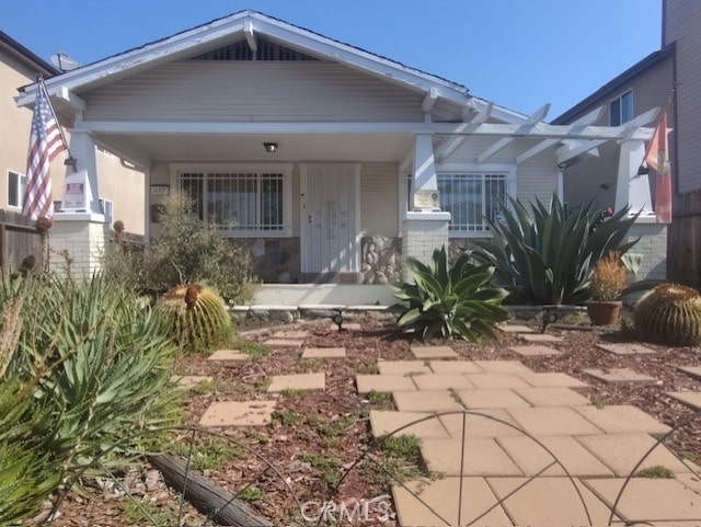 view of front of house featuring covered porch